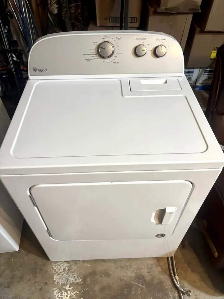 A white dryer with the door closed