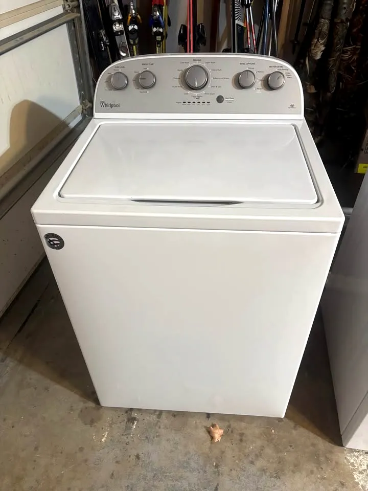 A white top-loading washer